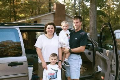 Karen Vavrek Bone Family. (L-R) Karen (1966), Trevor (1996), Joshua (1998), Todd (196?). Karen and T
